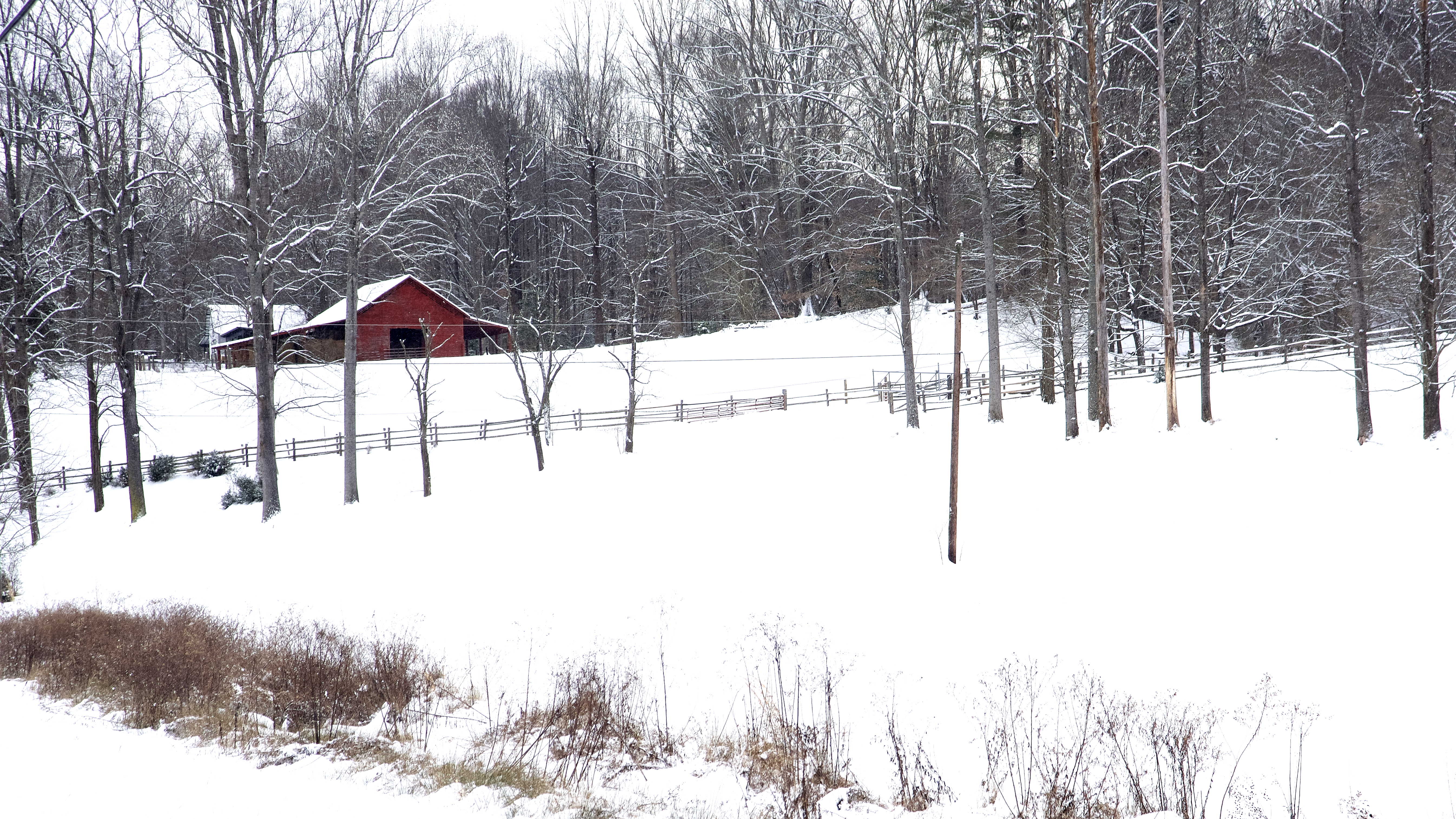 Red Barn With Snow Covered Ground