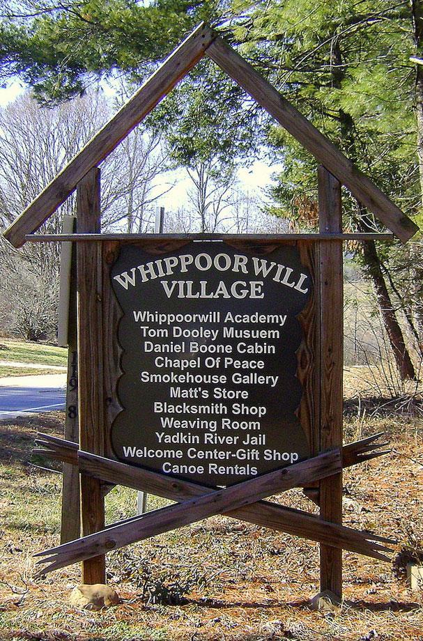 Whippoorwill Academy & Village sign